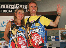 Anita Ortiz and Matt Carpenter celebrate their victory